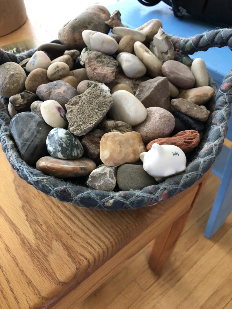 Blue woven basket full of stones